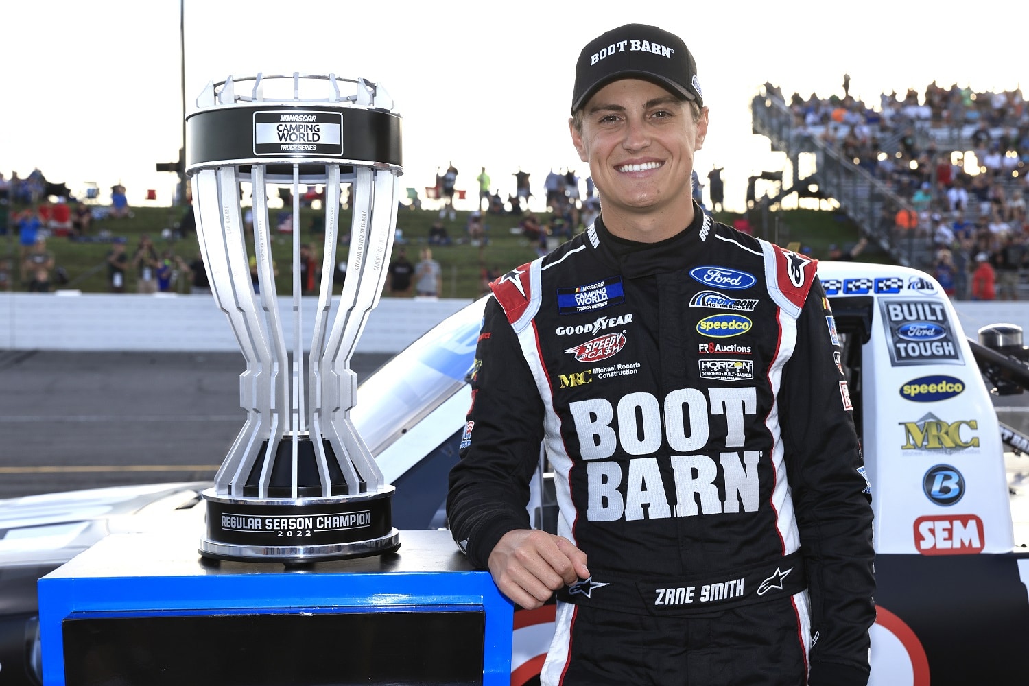 Zane Smith, winner the 2002 NASCAR Camping World Truck Series Regular Season Championship, poses for photos prior to the TSport 200 at Indianapolis Raceway Park on July 29, 2022.