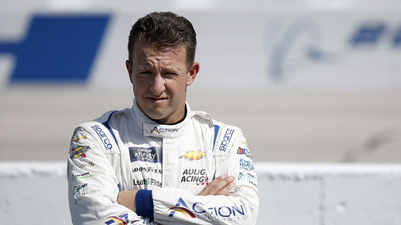 AJ Allmendinger looks on during qualifying for the NASCAR Xfinity Series Sport Clips Haircuts VFW Help A Hero 200 at Darlington Raceway on Sept. 3, 2022.