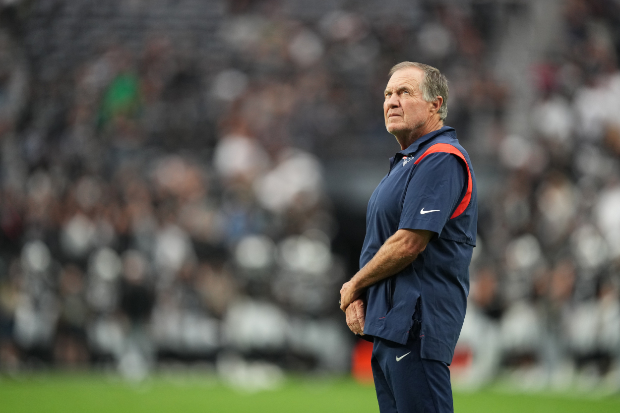 Head coach Bill Belichick of the New England Patriots looks on during warm-up before a preseason game against the Las Vegas Raiders.