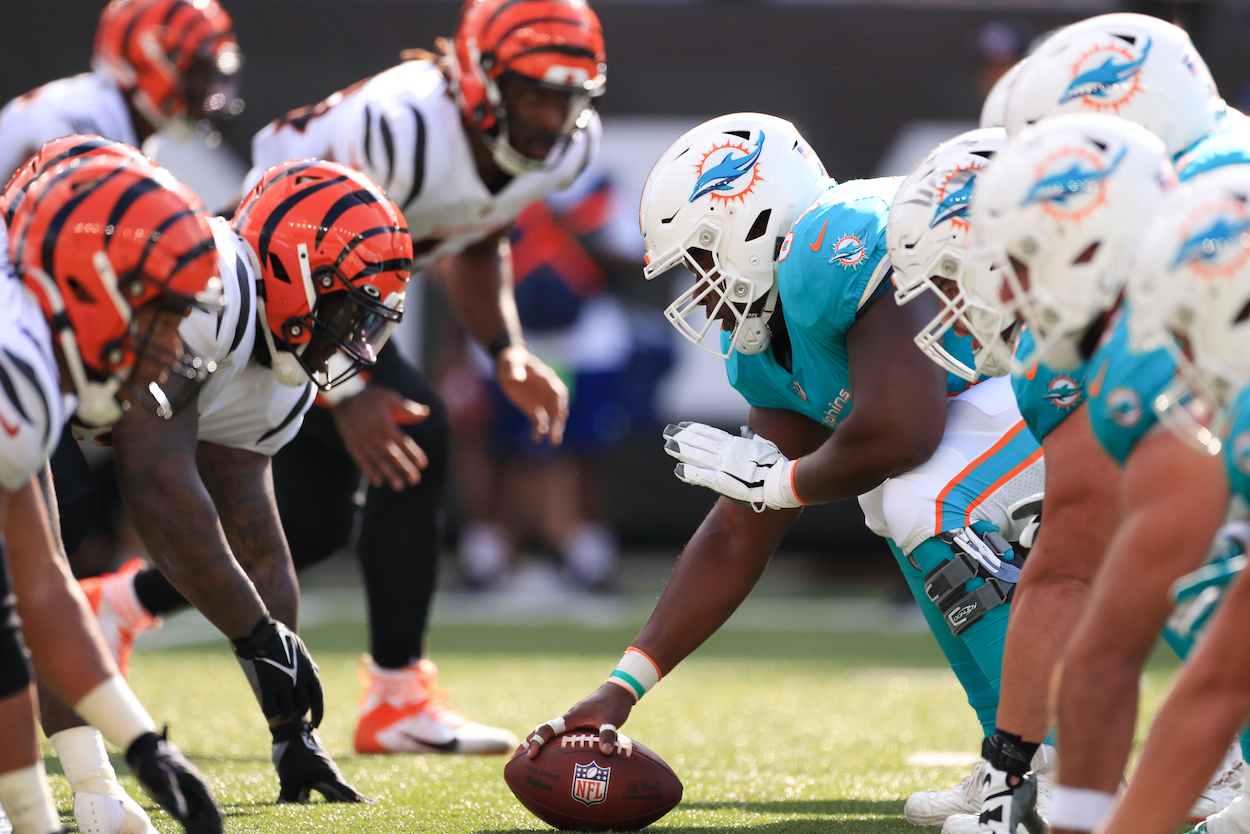 The Bengals and Dolphins line up for a play.