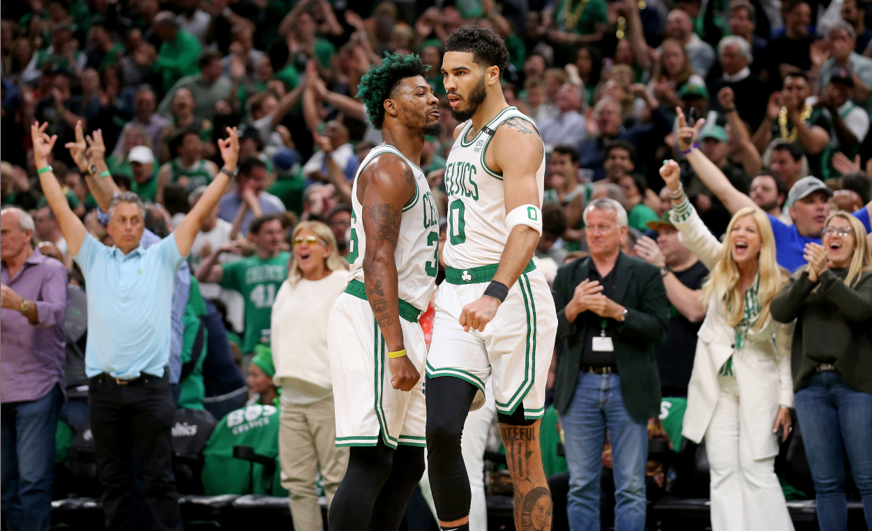 Marcus Smart and Jayson Tatum of the Boston Celtics celebrate.