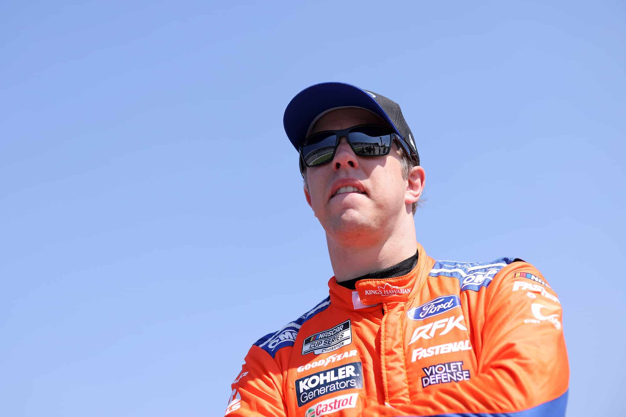 Brad Keselowski looks on before practice