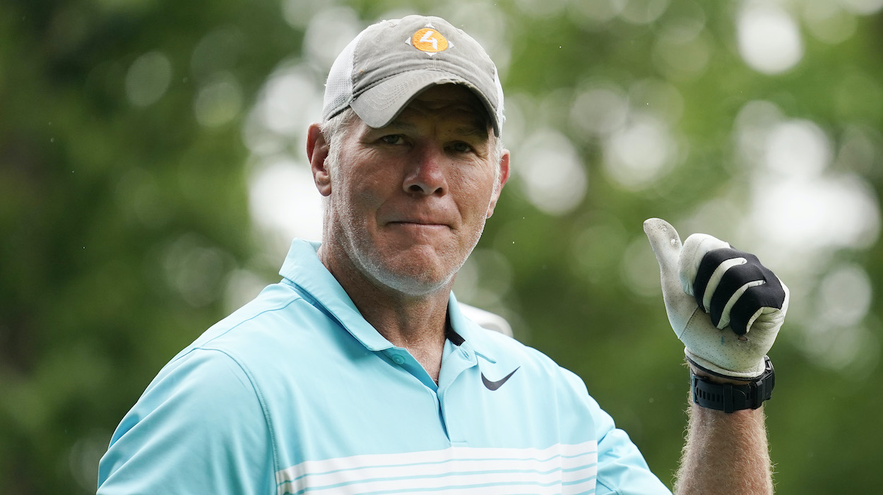 Former NFL player Brett Favre walks off the 10th tee box during the Celebrity Foursome at the second round of the American Family Insurance Championship.