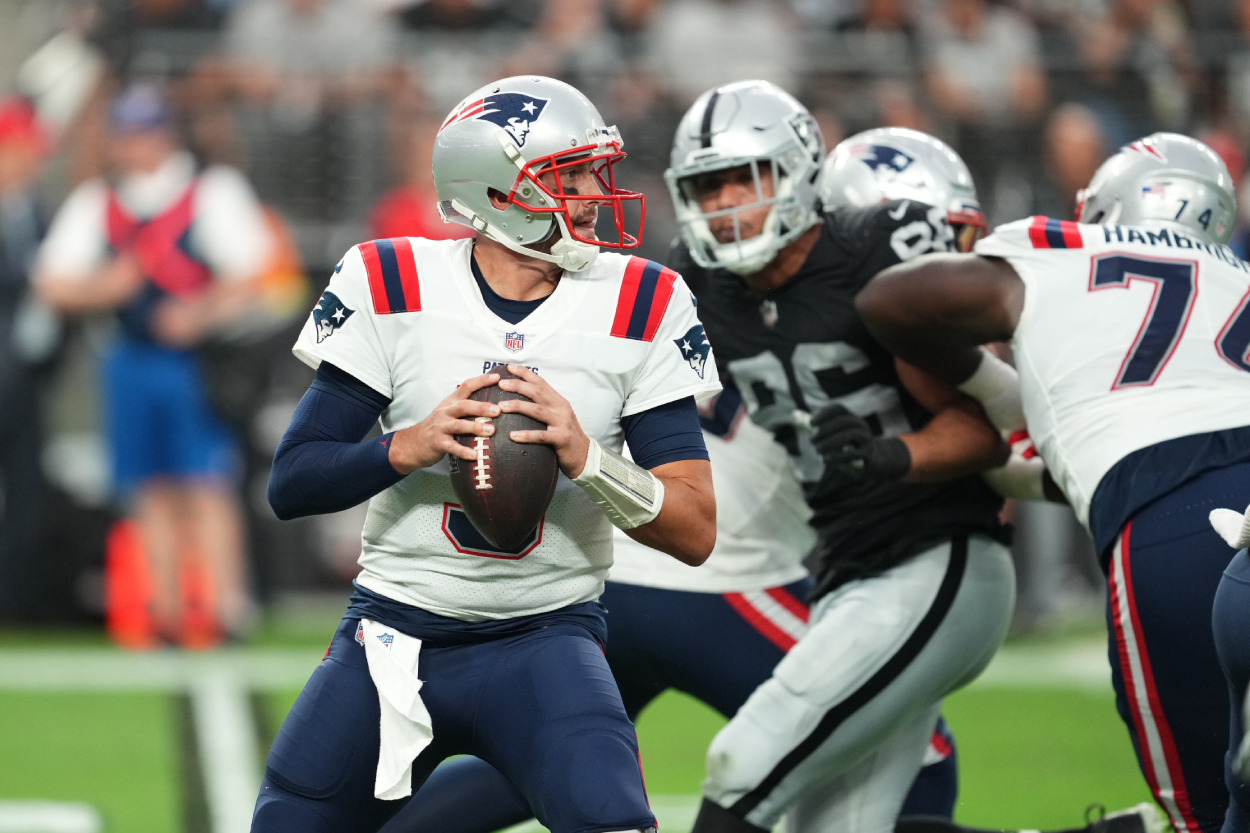 Quarterback Brian Hoyer of the New England Patriots looks to throw a pass against the Las Vegas Raiders.