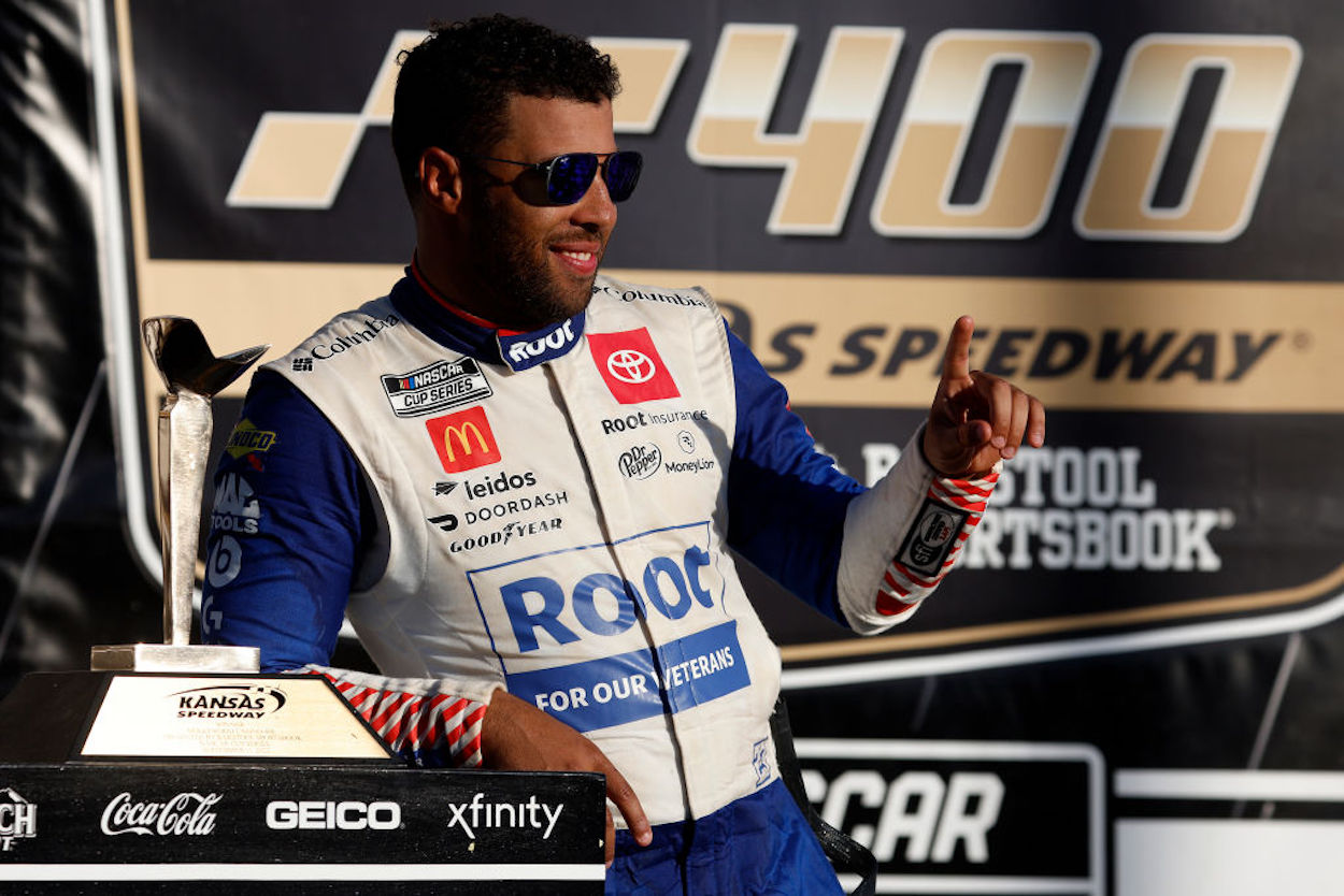 Bubba Wallace celebrates after winning the NASCAR Cup Series Hollywood Casino 400.