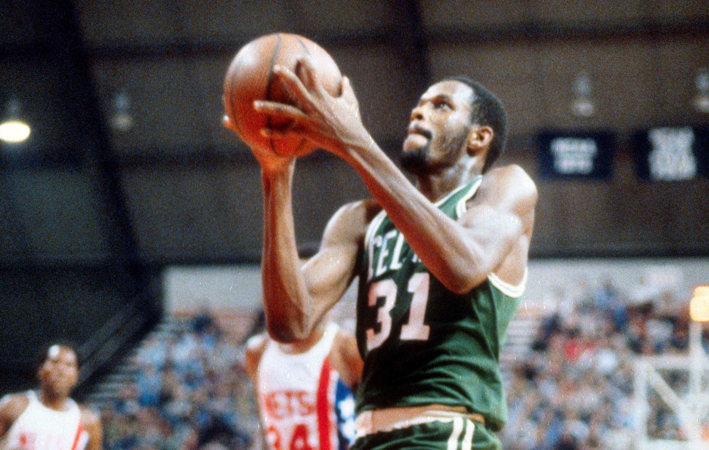 Cedric Maxwell of the Boston Celtics drives toward the basket.