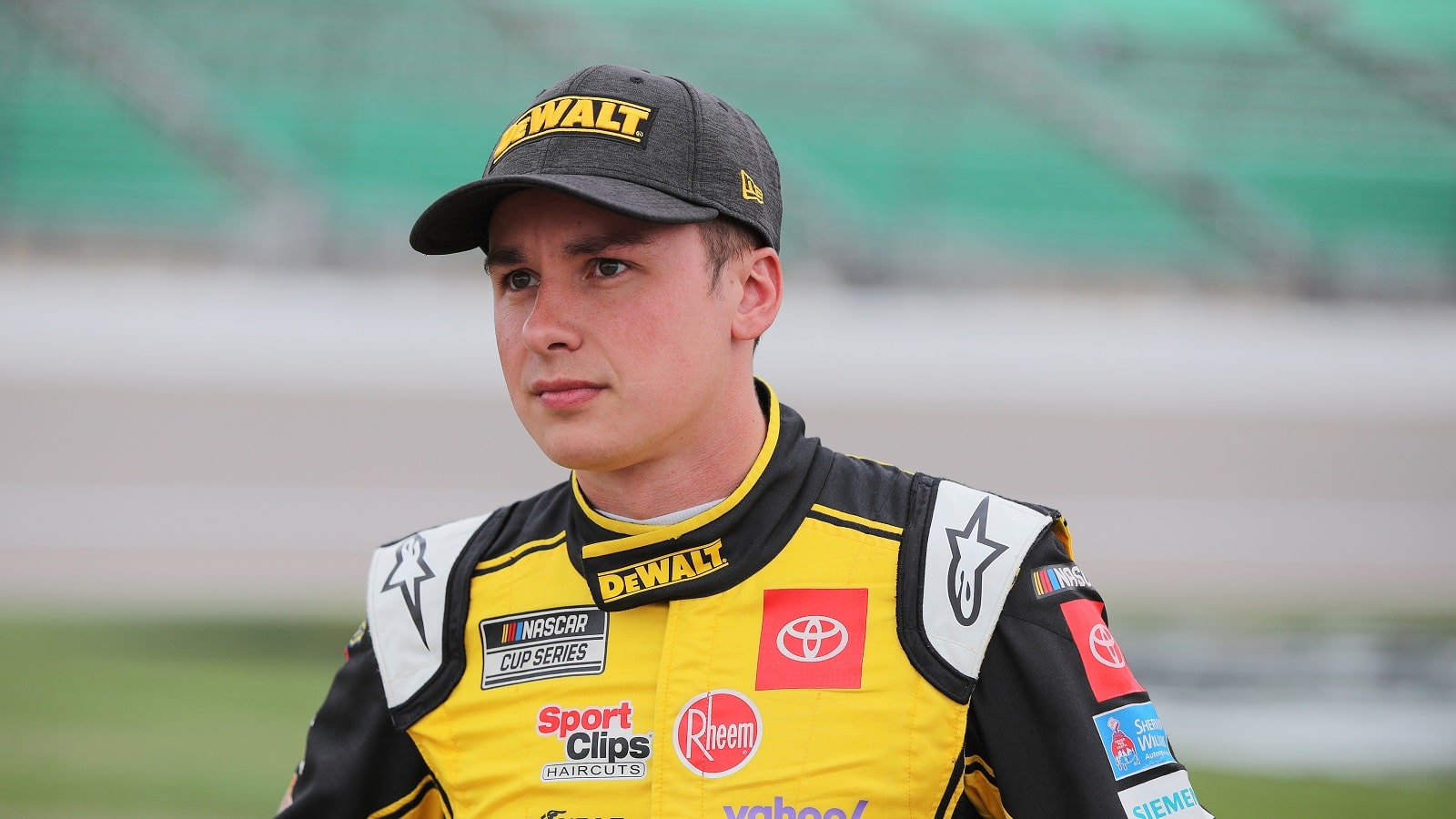 Christopher Bell looks on during qualifying for the NASCAR Cup Series Hollywood Casino 400 at Kansas Speedway on Sept. 10, 2022.