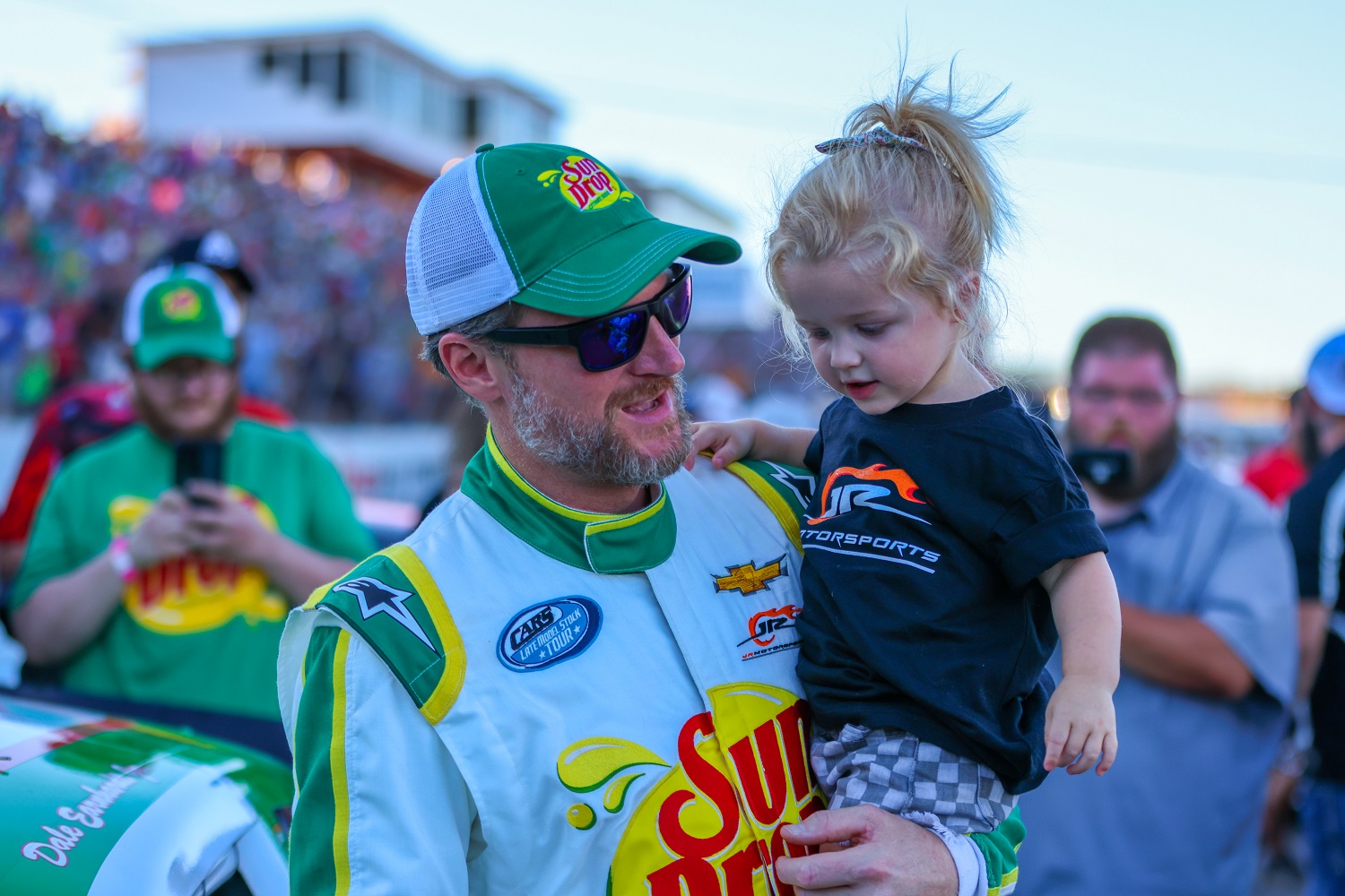Dale Earnhardt Jr. spends time with his daughter before the Cars Tour LMSC 125 on Aug. 31, 2022, at the North Wilkesboro Speedway.