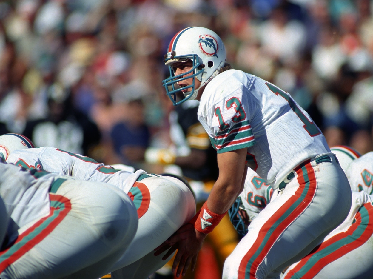 Dan Marino prepares to take a snap