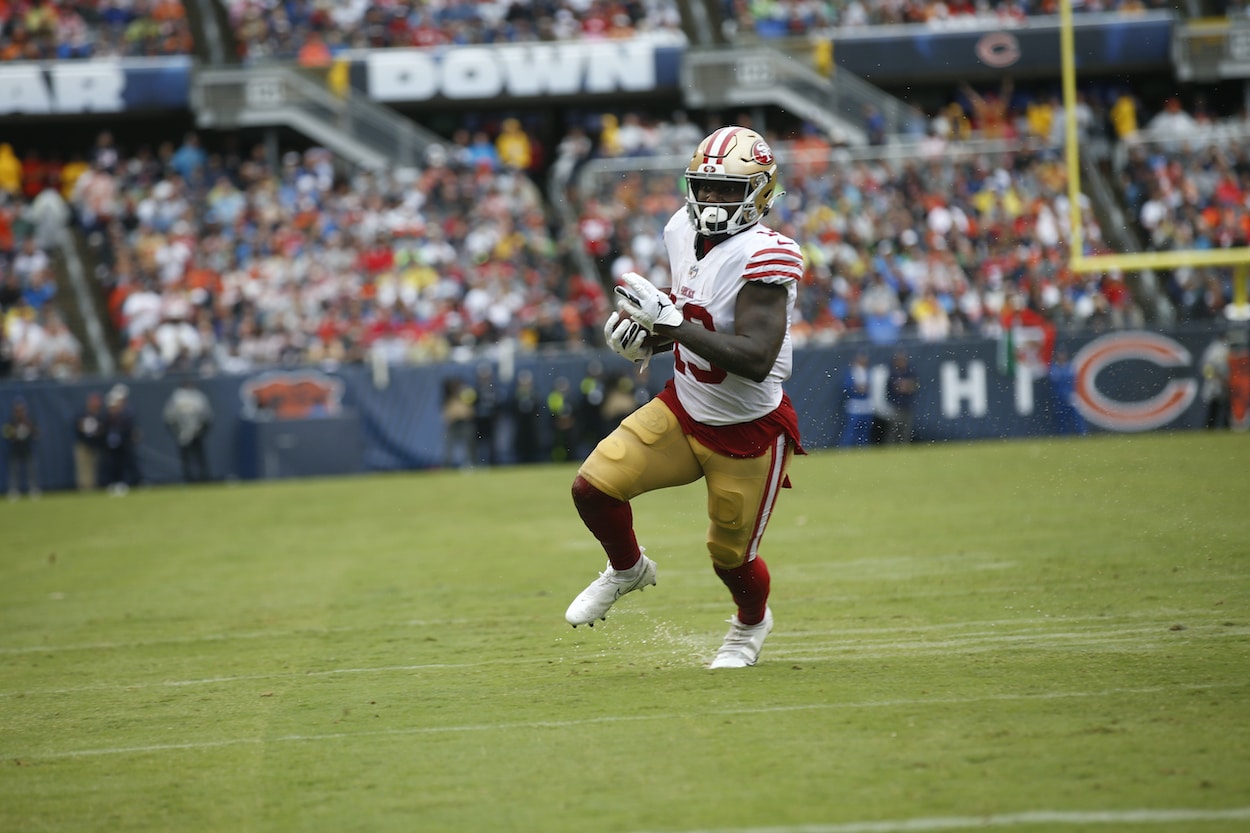 Deebo Samuel runs against the Bears.