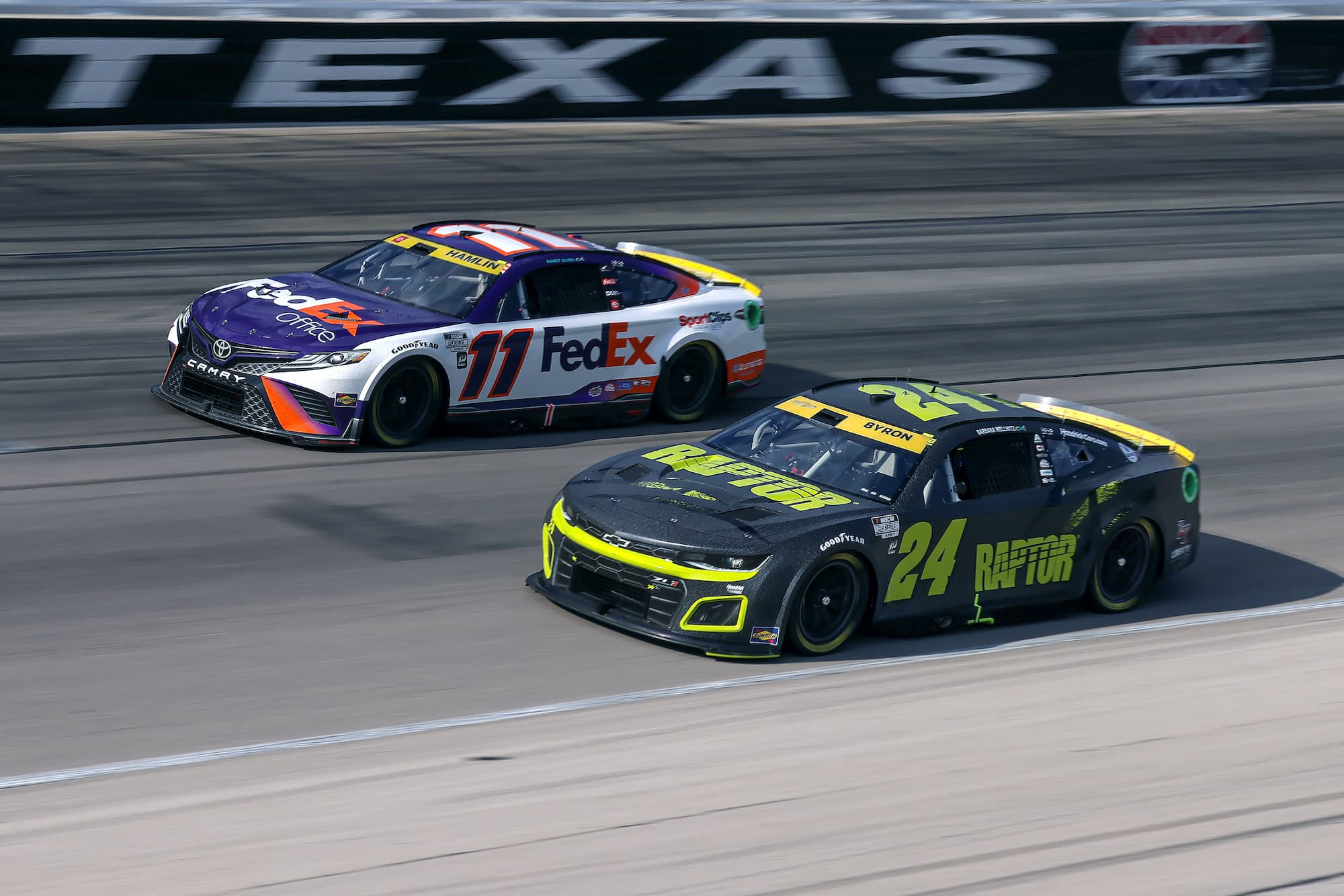 Denny Hamlin and William Byron race