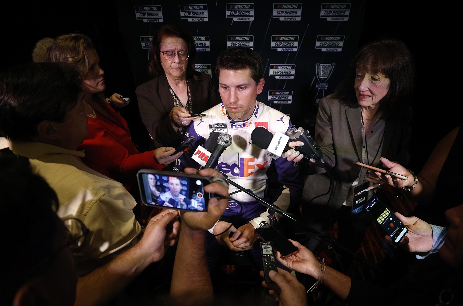 NASCAR driver Denny Hamlin speaks during the NASCAR Cup Series Playoff Media Day at Charlotte Convention Center on Sept. 1, 2022, in Charlotte, North Carolina.
