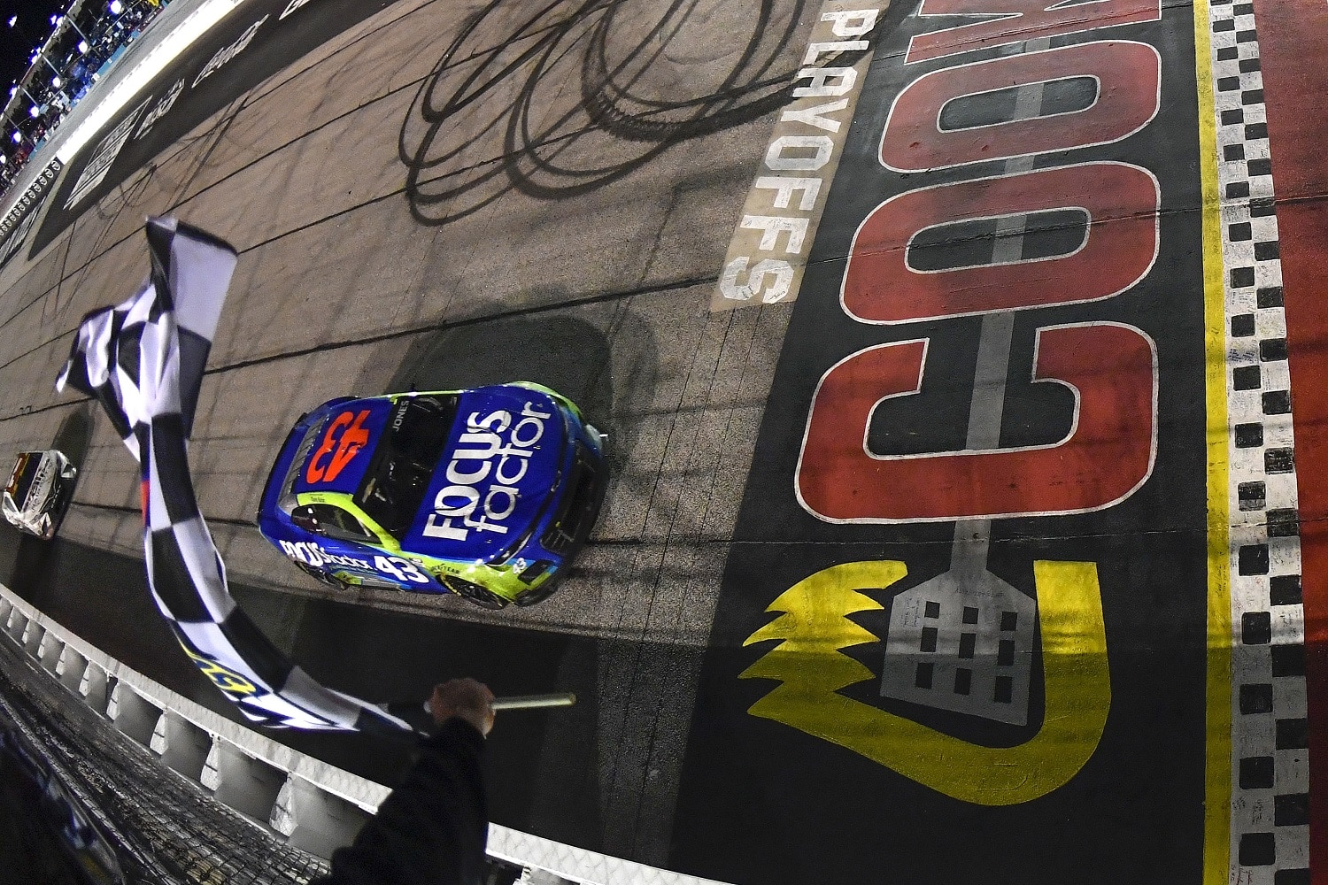 Erik Jones takes the checkered flag to win the NASCAR Cup Series Cook Out Southern 500 at Darlington Raceway on Sept. 4, 2022. | Logan Riely/Getty Images