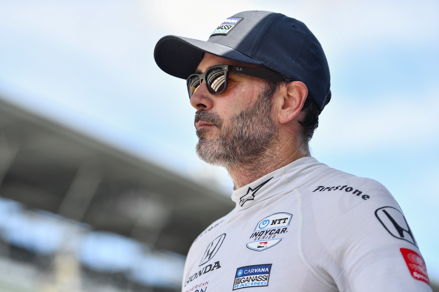 Jimmie Johnson looks on during practice for the NTT IndyCar Series Gallagher Grand Prix at Indianapolis Motor Speedway on July 29, 2022.