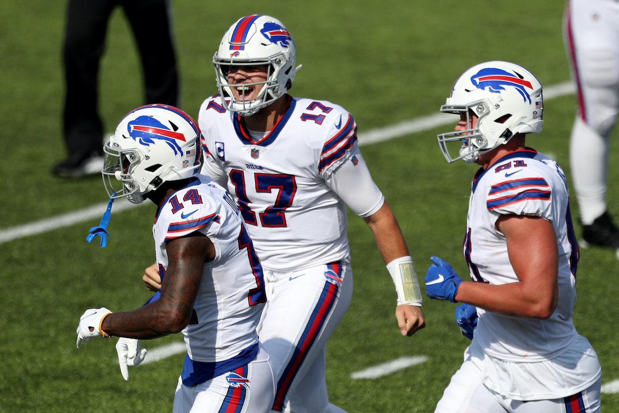 Josh Allen celebrates with his teammates after a touchdown.