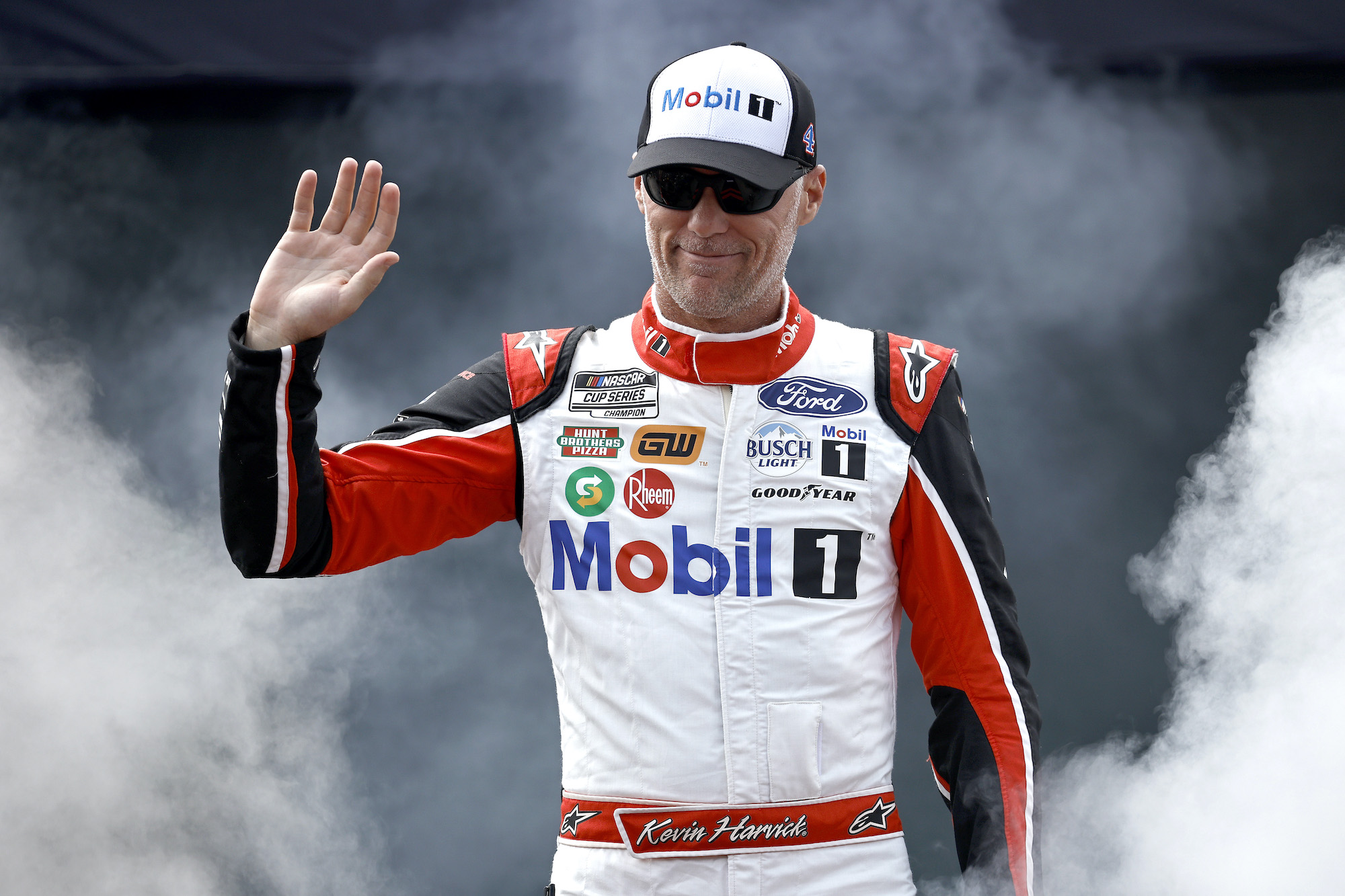 Kevin Harvick waves to fans