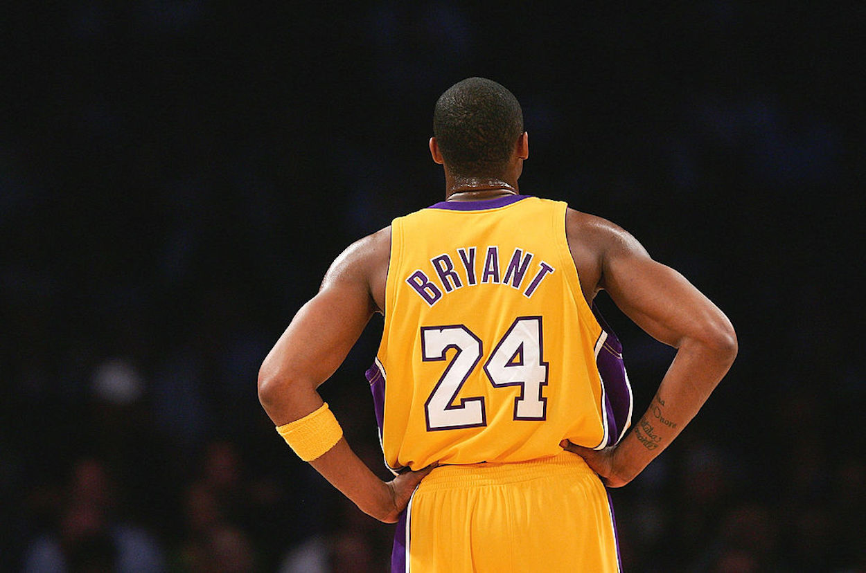 Los Angeles Lakers legend Kobe Bryant stands on the court.