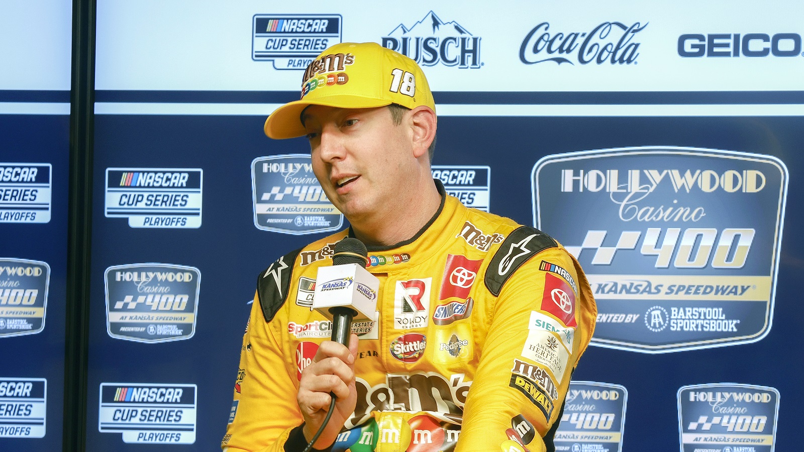 Kyle Busch speaks to the media during a news conference after practice for the NASCAR Cup Series Hollywood Casino 400 at Kansas Speedway on Sept. 10, 2022.