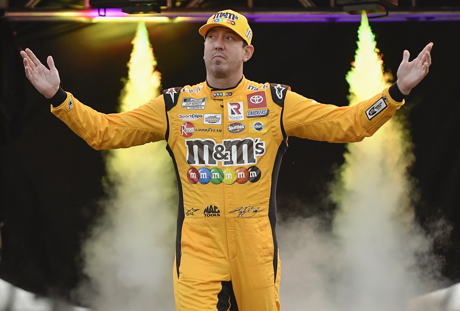 Kyle Busch walks onstage during driver intros prior to the NASCAR Cup Series Bass Pro Shops Night Race at Bristol Motor Speedway on Sept. 17, 2022.