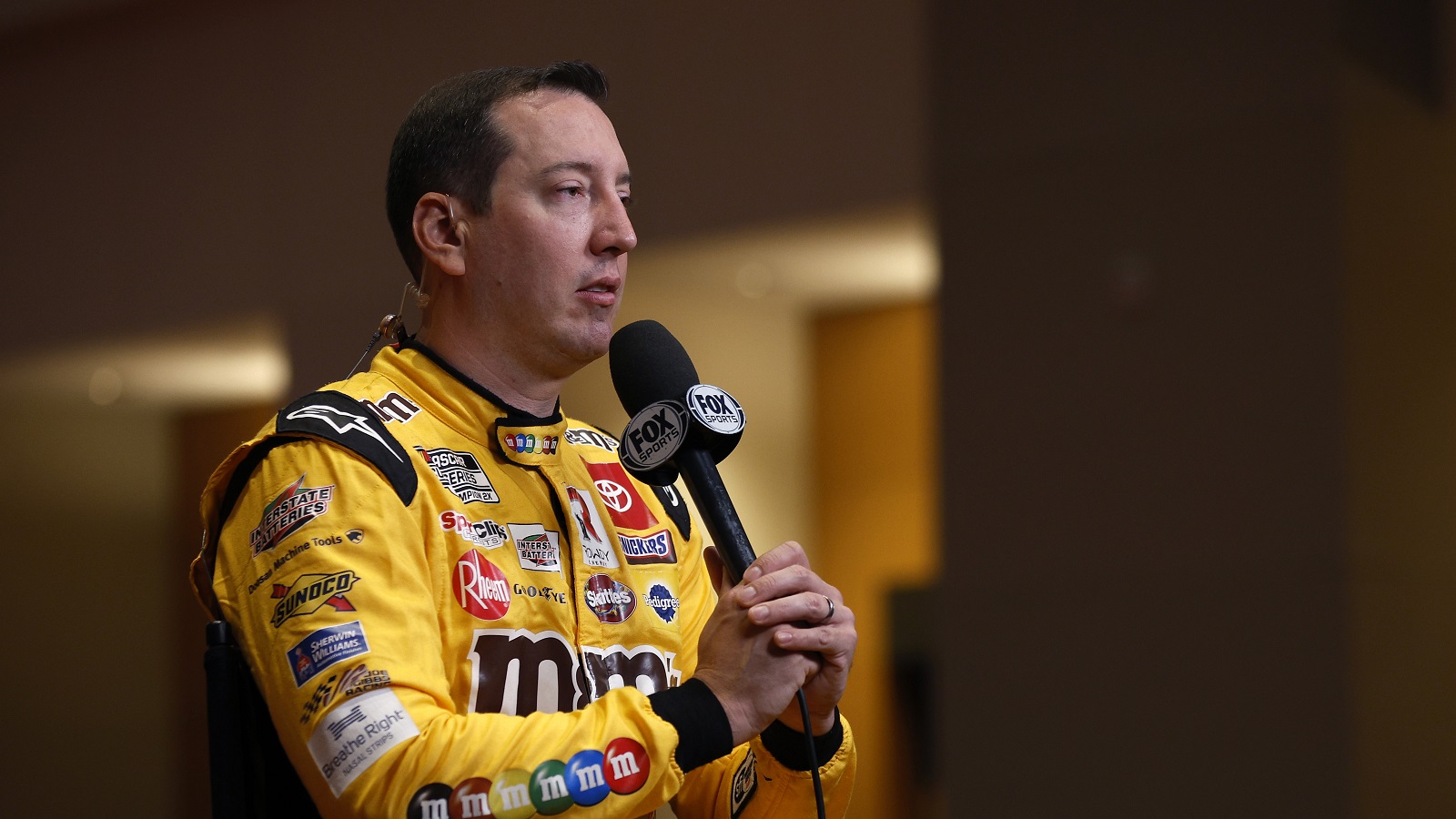 NASCAR driver Kyle Busch speaks with reporters during the NASCAR Cup Series Playoff Media Day at Charlotte Convention Center on Sept. 1, 2022.