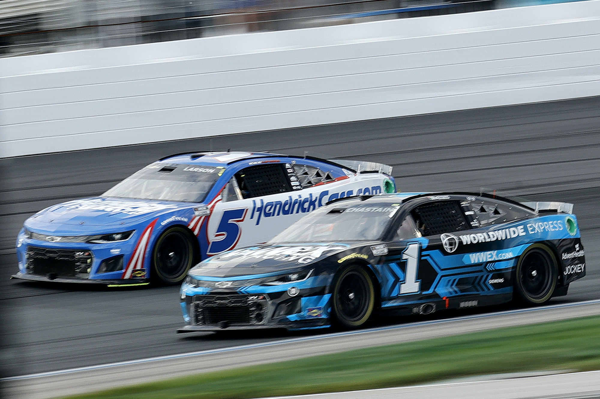Ross Chastain and Kyle Larson race