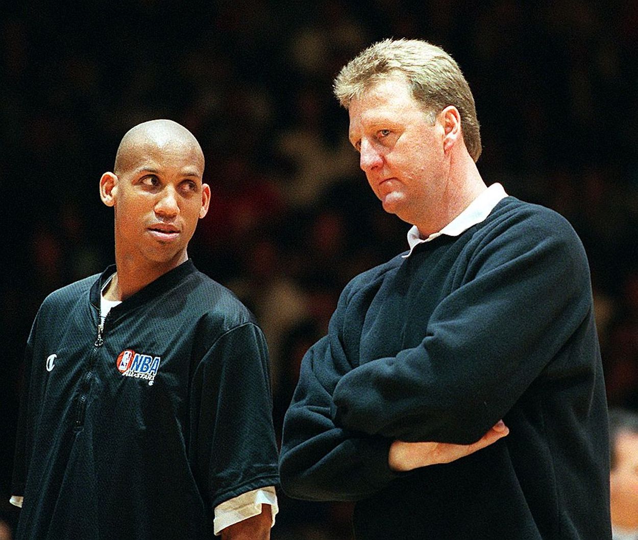 Larry Bird (R) and Reggie Miller (L) stand together during the 1997-98 NBA season.