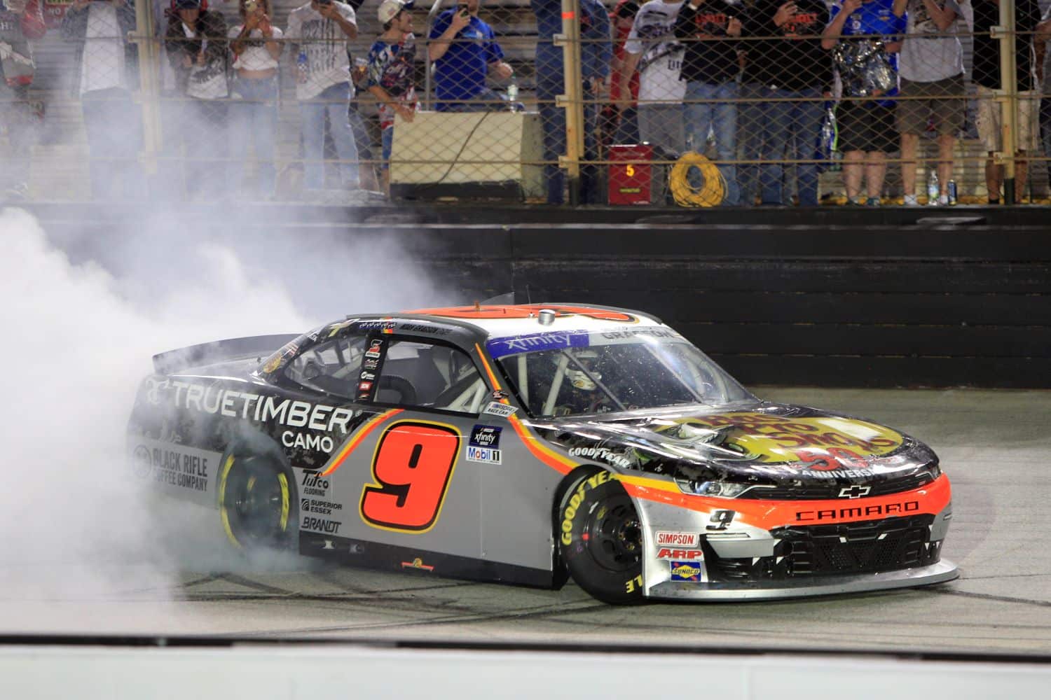 Noah Gragson celebrates Friday's Xfinity Series victory in the No. 9 Chevy at Bristol Motor Speedway.