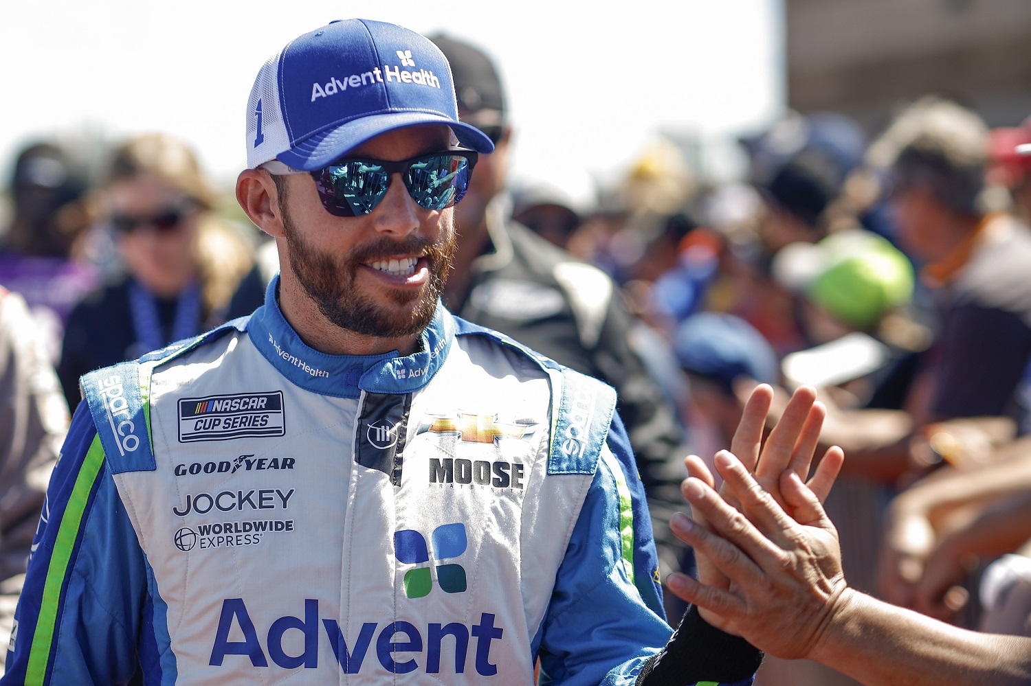 Ross Chastain greets NASCAR fans prior to the NASCAR Cup Series Hollywood Casino 400 at Kansas Speedway on Sept. 11, 2022.