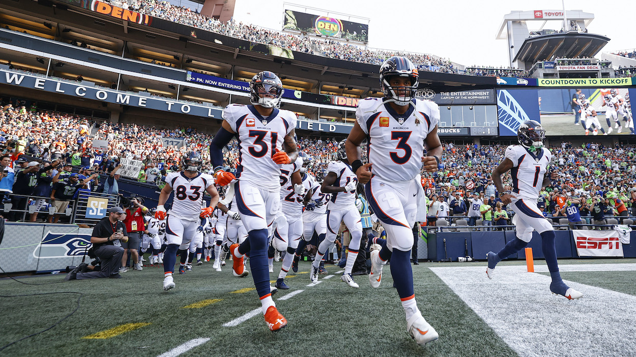 Russell Wilson of the Denver Broncos takes the field before the game against the Seattle Seahawks at Lumen Field.