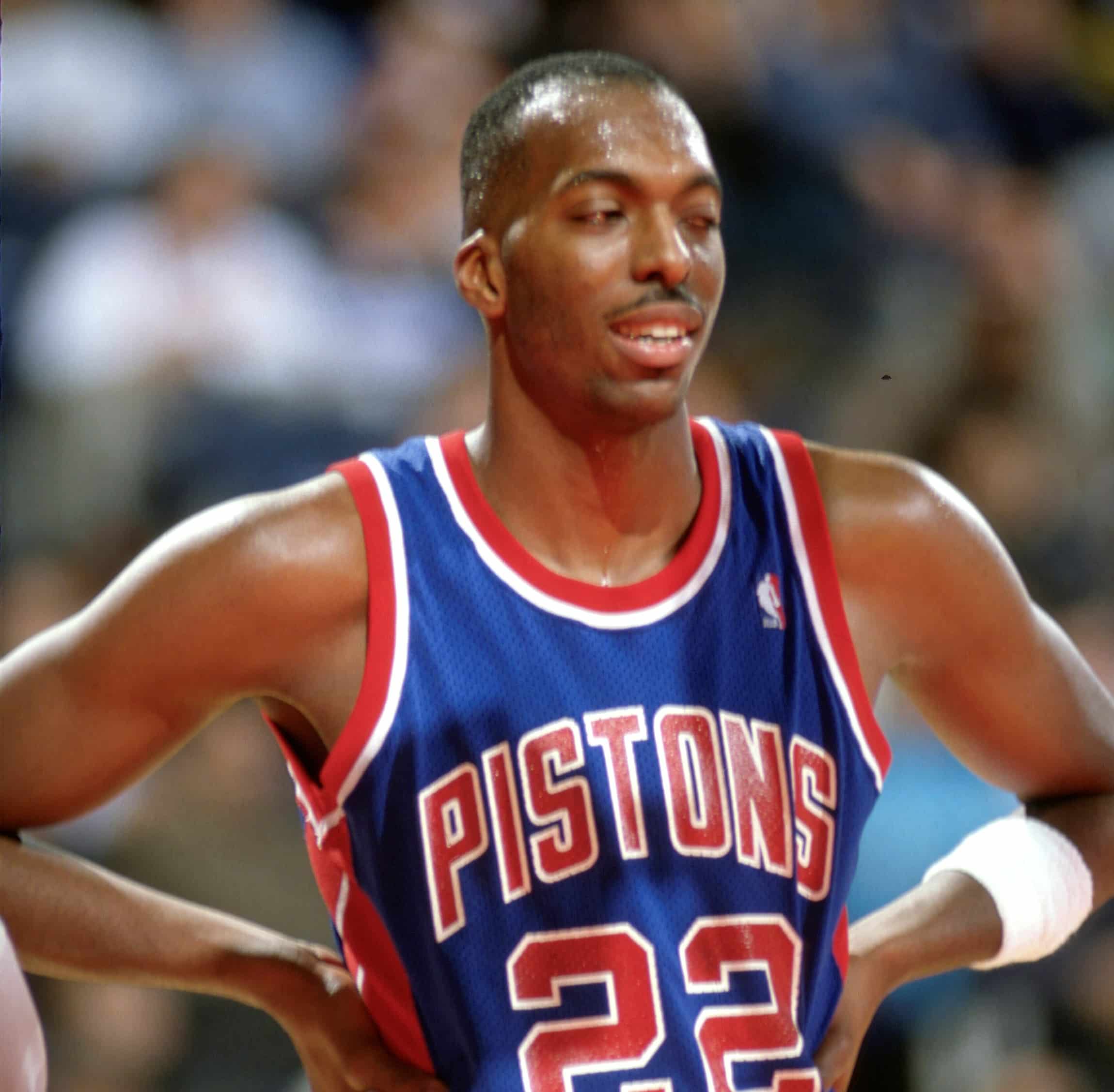 John Salley of the Detroit Pistons looks on against the Washington Bullets.