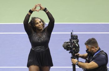 Serena Williams greets fans after her last career match, losing to Ajla Tomljanovic at the 2022 U.S. Open