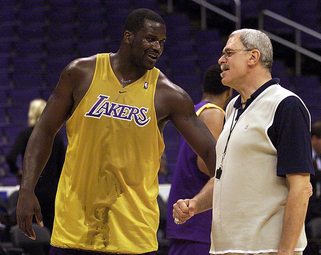 Shaquille O'Neal (L) and Phil Jackson (R) talk during their time with the LA Lakers.