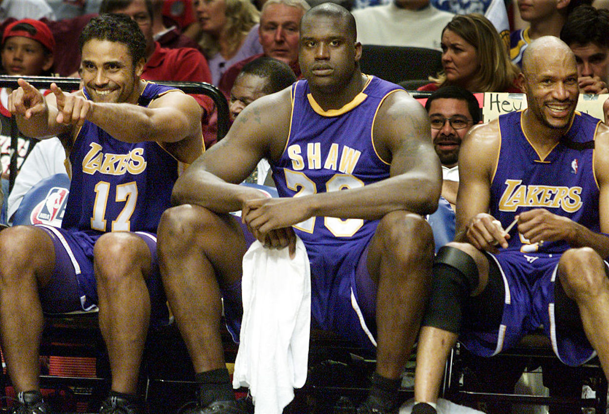 Shaquille O'Neal (C) sits on the Los Angeles Lakers bench.