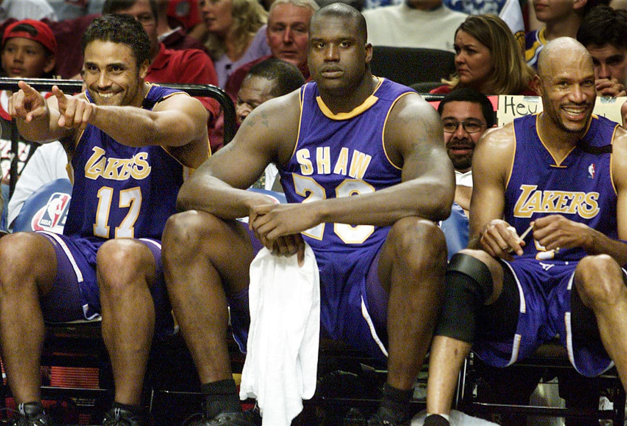 Shaquille O'Neal (C) sits on the Los Angeles Lakers bench.