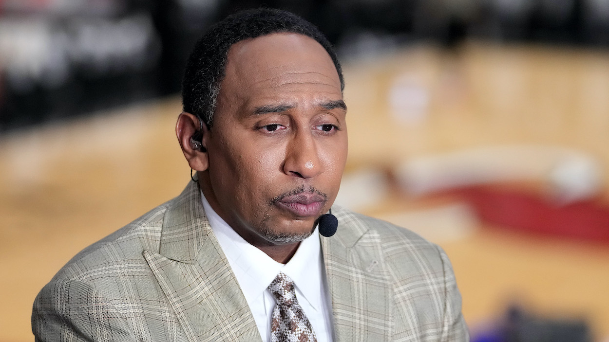 ESPN commentator Stephen A. Smith looks on.