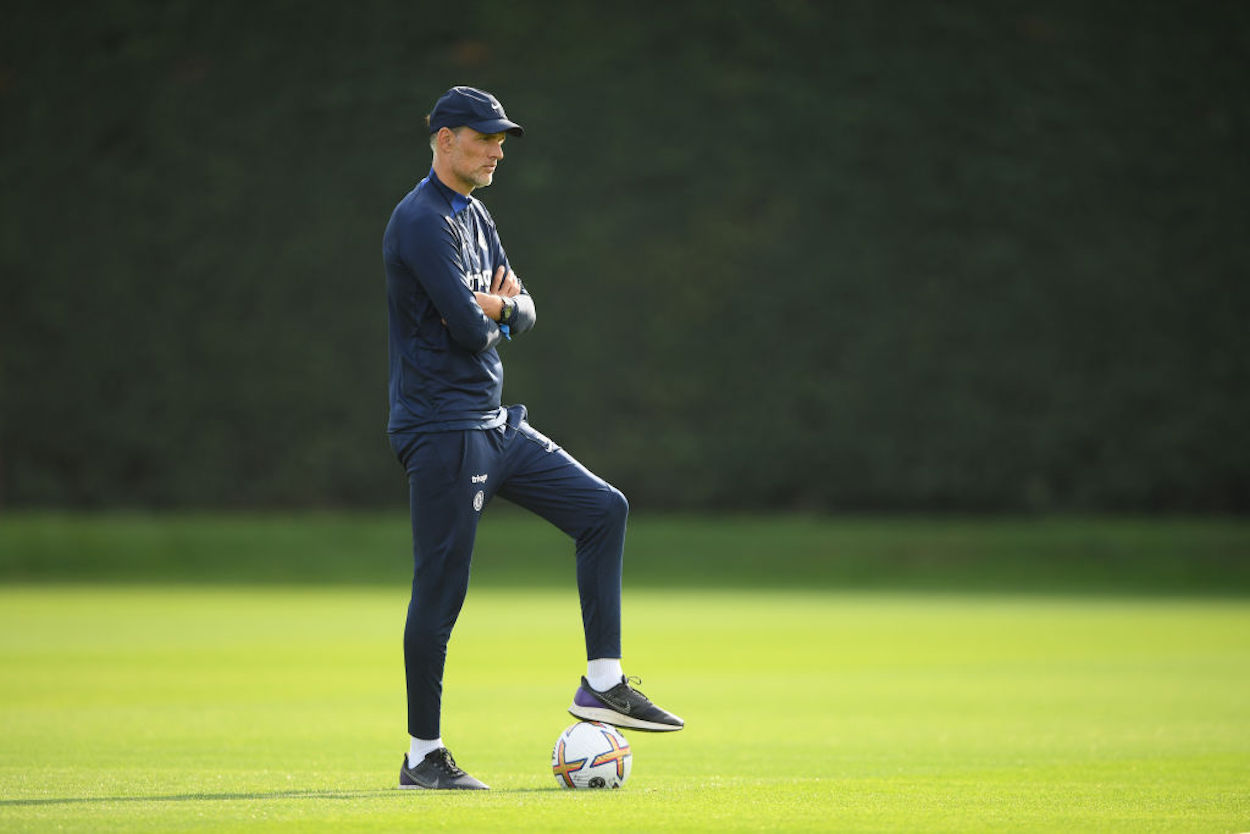 Manager Thomas Tuchel stands alone during a Chelsea training session.