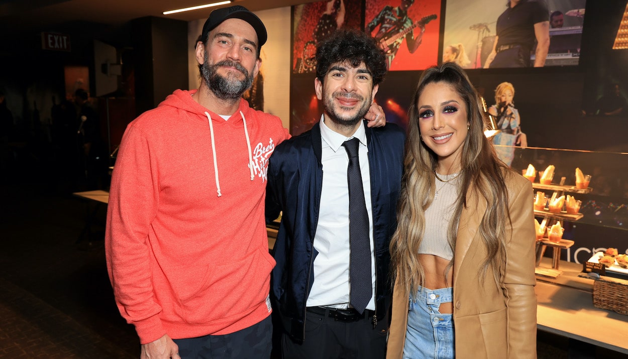 AEW CEO Tony Khan with CM Punk and Dr. Britt Baker, D.M.D.