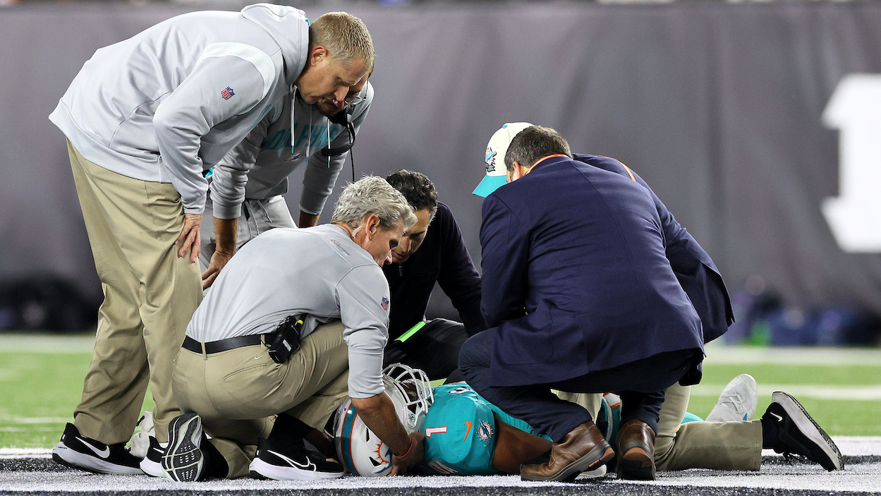Medical staff tend to quarterback Tua Tagovailoa of the Miami Dolphins after his concussion.