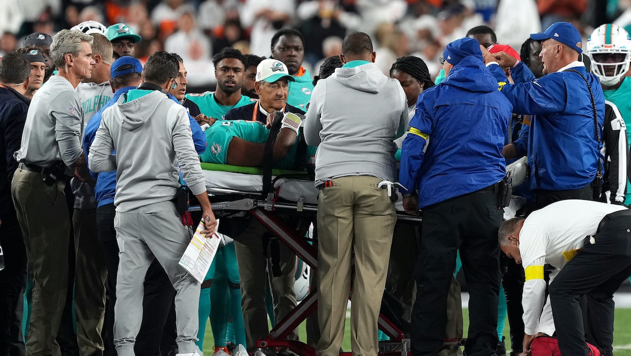 Medical staff tend to quarterback Tua Tagovailoa of the Miami Dolphins.