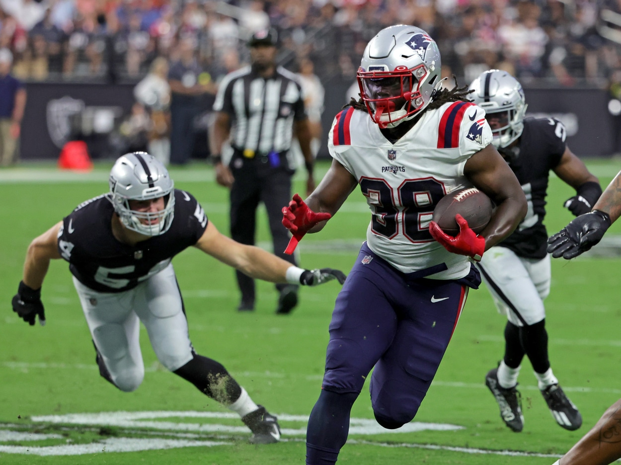 Running back Rhamondre Stevenson of the New England Patriots runs against the Las Vegas Raiders.