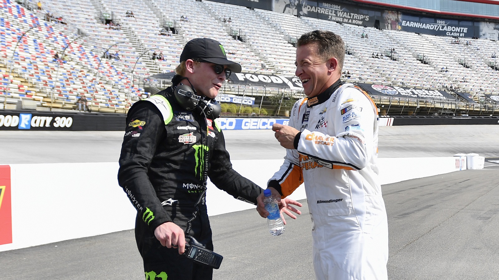 Ty Gibbs and AJ Allmendinger share a laugh on the grid during qualifying for the NASCAR Xfinity Series Food City 300 at Bristol Motor Speedway on Sept. 16, 2022.