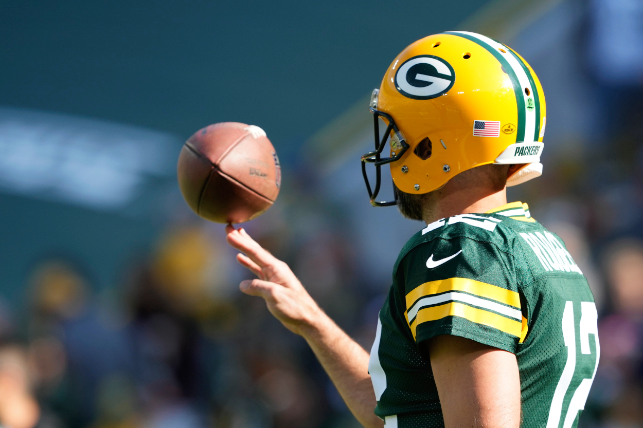 Aaron Rodgers of the Green Bay Packers warms up before his game against the New England Patriots.