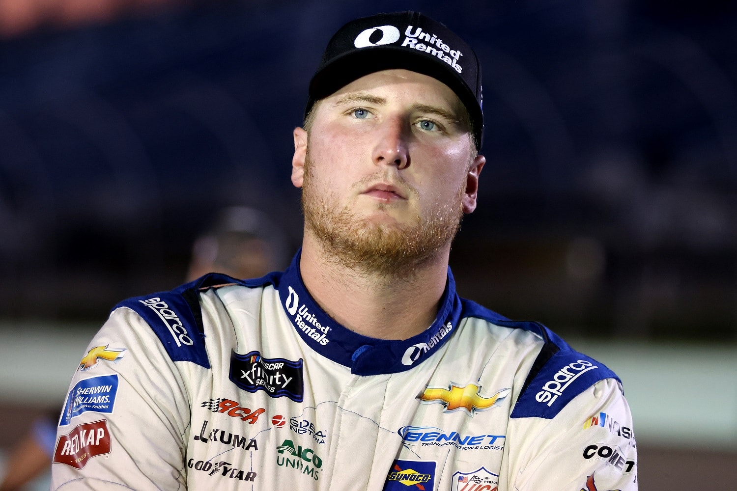 Austin Hill stands on pit road during qualifying for the NASCAR Xfinity Series Contender Boats 300 at Homestead-Miami Speedway on Oct. 21, 2022 in Homestead, Florida. | Jared East/Getty Images