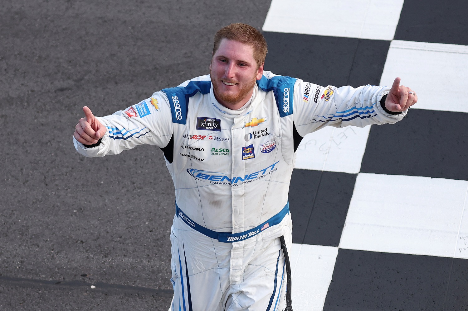 Austin Hill celebrates after winning the NASCAR Xfinity Series Alsco Uniforms 250 at Atlanta Motor Speedway on July 9, 2022. | James Gilbert/Getty Images