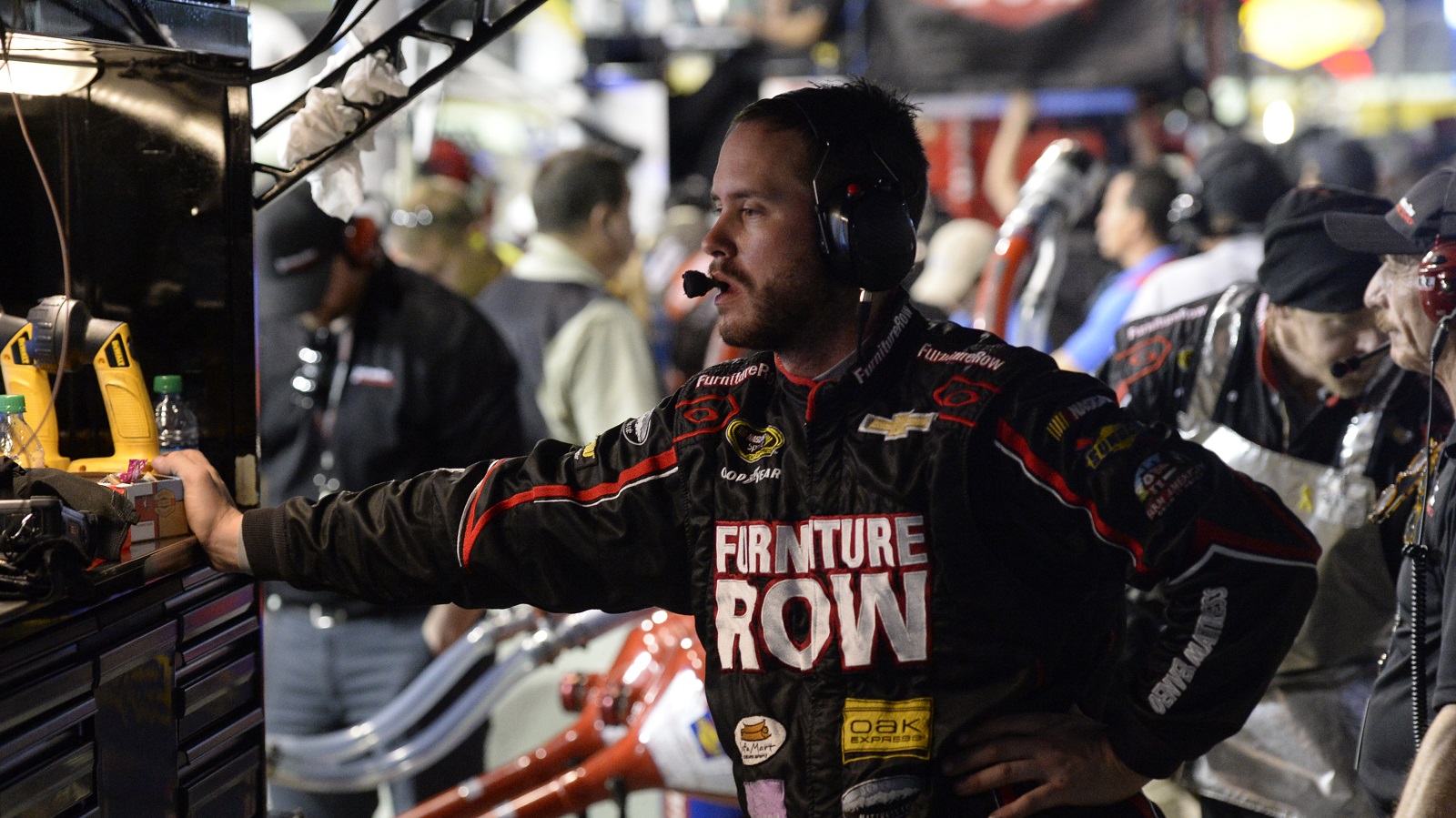 Martin Truex Jr. crew member Blake Harris looks over monitors late in the Ford EcoBoost 400 at the Homestead-Miami Speedway on Nov. 22.