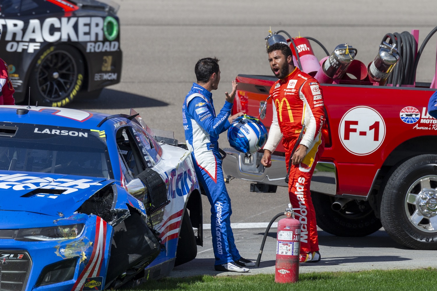 Bubba Wallace yells at Kyle Larson after they wrecked during the NASCAR Cup Series Playoff South Point 400 on Oct. 16, 2022, at Las Vegas Motor Speedway.