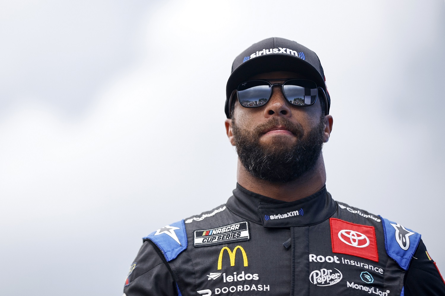 Bubba Wallace walks onstage during driver intros prior to the NASCAR Cup Series Go Bowling at The Glen at Watkins Glen International on Aug. 21, 2022.