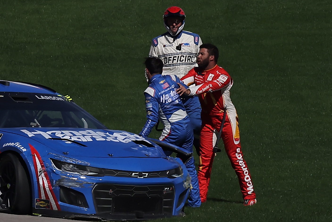 Bubba Wallace confronts Kyle Larson after a wreck during the NASCAR Cup Series South Point 400 at Las Vegas Motor Speedway on Oct. 16, 2022.