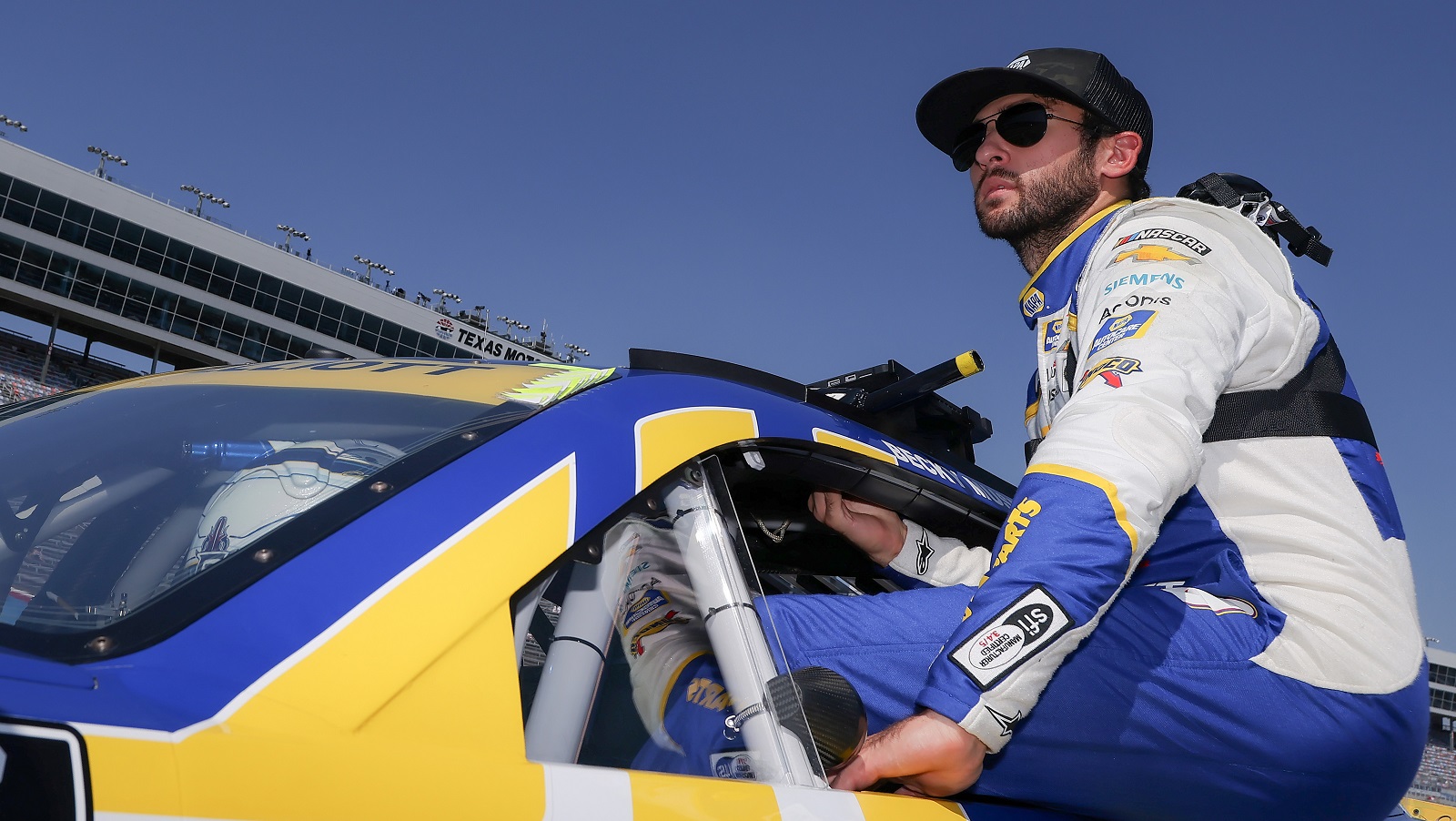 Chase Elliott enters his car during practice for the NASCAR Cup Series Auto Trader EchoPark Automotive 500 at Texas Motor Speedway on Sept. 24, 2022, in Fort Worth, Texas.