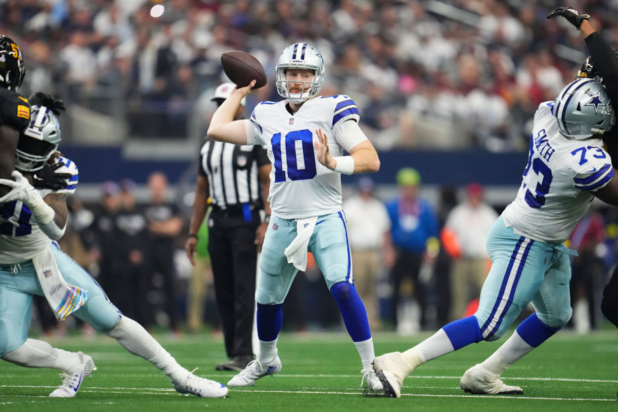 Dallas Cowboys quarterback Cooper Rush throws a pass.